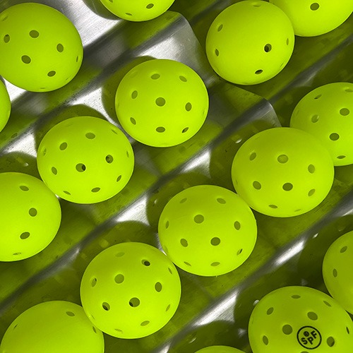 Pickleball counting and packaging machine